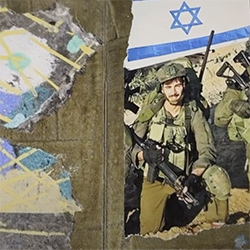 Close-up of frame from video showing commemorative folding book